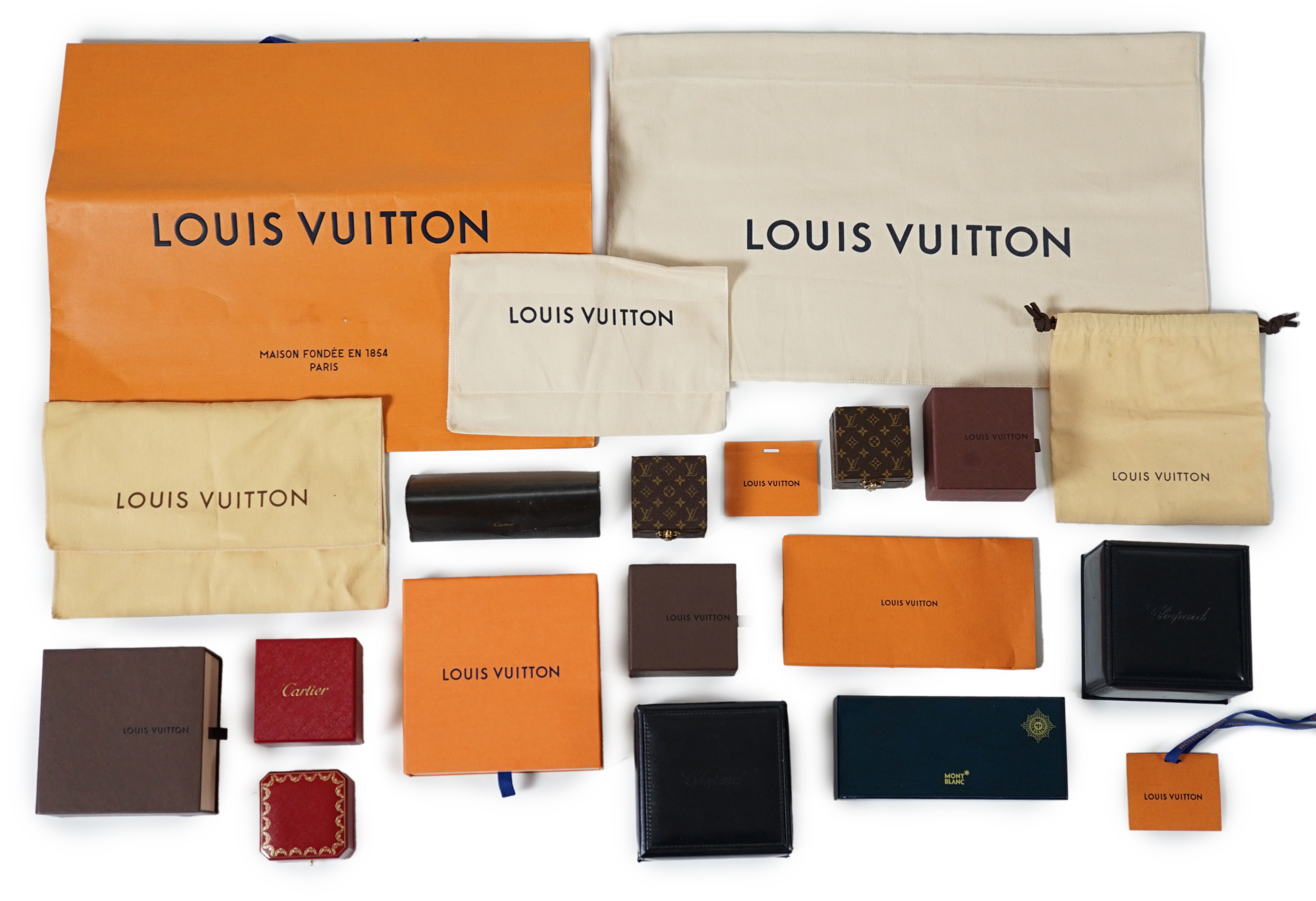 A selection of empty designer boxes including Cartier, Louis Vuitton and Chopard